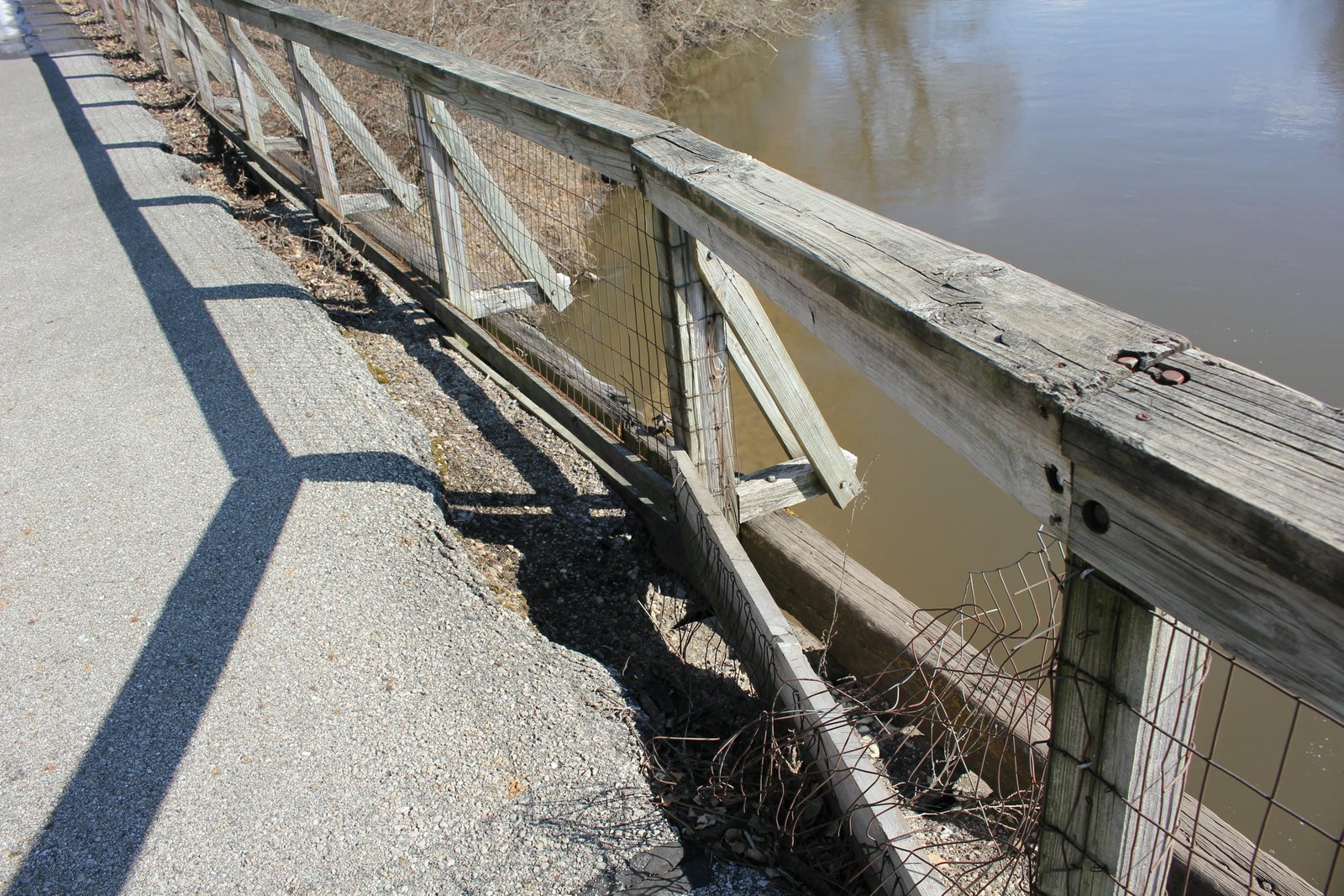 Severely damaged railing and deck